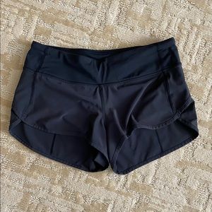 Worn twice. Lulu lemon, black, 2.5 length, size 4.